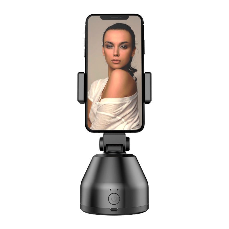 Phone holder with a smartphone displaying a woman's face on a white background