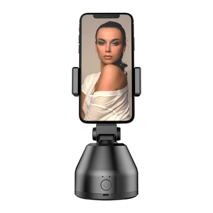 Phone holder with a smartphone displaying a woman's face on a white background