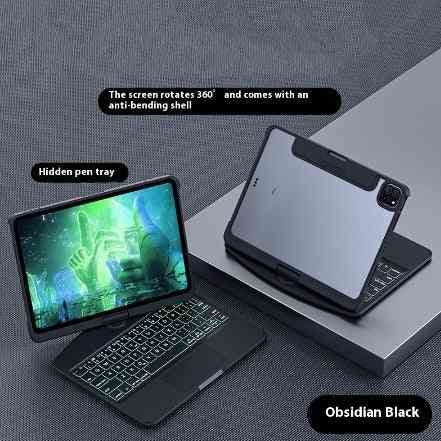 Tablet with keyboard cover and screen rotation feature on a gray surface