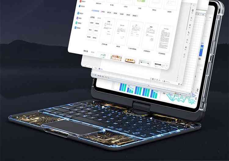 Open laptop displaying multiple screens on a dark background