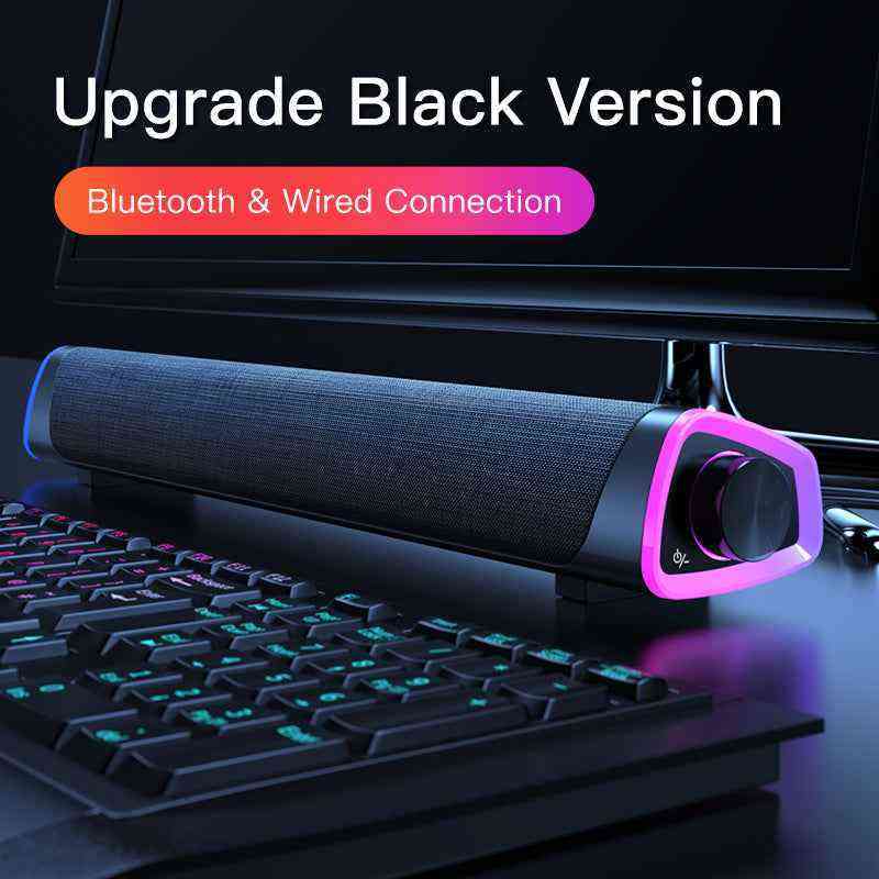 4D Computer Speaker Bar with Bluetooth and wired connection on a desk with keyboard and monitor