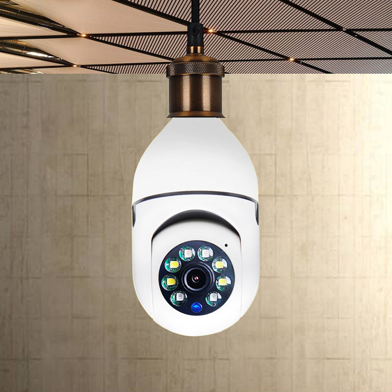 Smart camera light bulb hanging from a ceiling