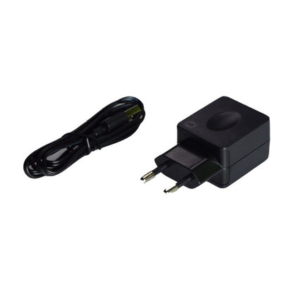 Black power adapter with plug and cable on a white background