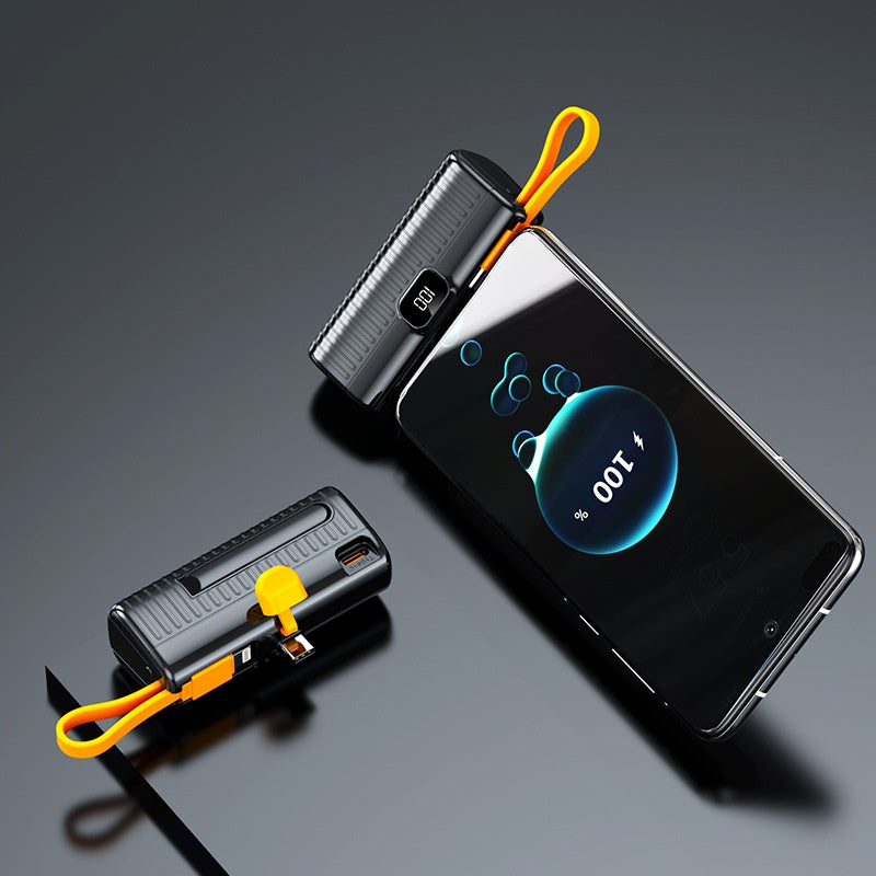 Two portable battery packs with yellow straps on a dark gray background