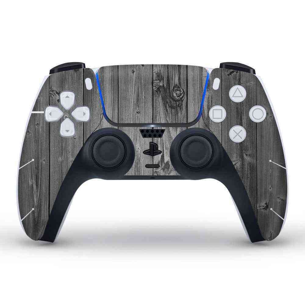 Gaming controller with wood-texture skin on a white background