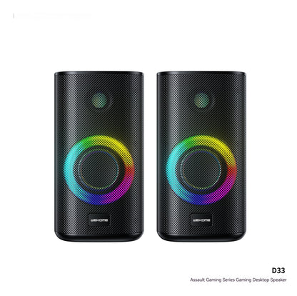 Pair of black gaming desktop speakers with RGB lighting on a white background