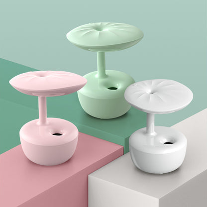 Three colorful desk lamps on a geometric background