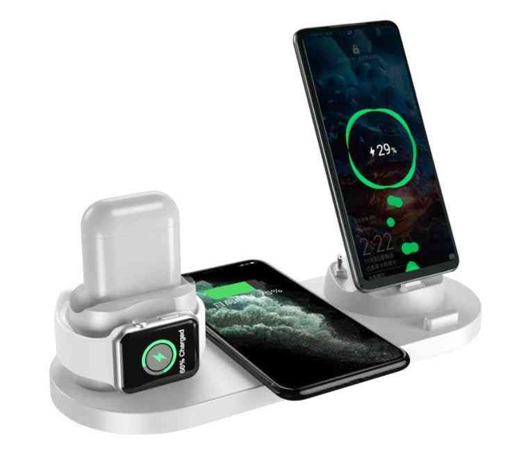 Multi-device charging station with smartphone, smartwatch, and headphones on a white background