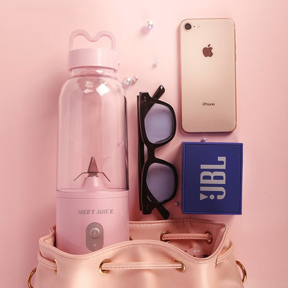 Pink juice maker, sunglasses, phone, JBL speaker on a pink background