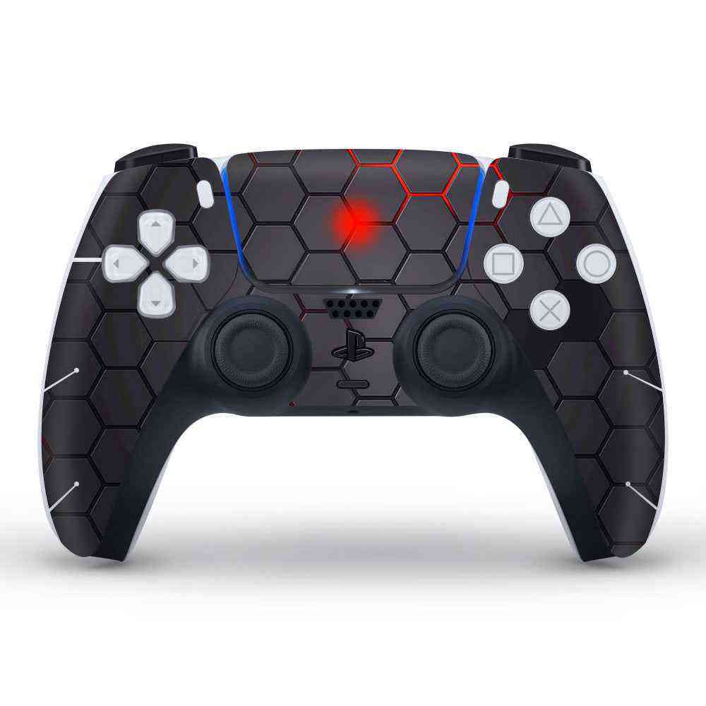 Black gaming controller with hexagonal pattern on a white background