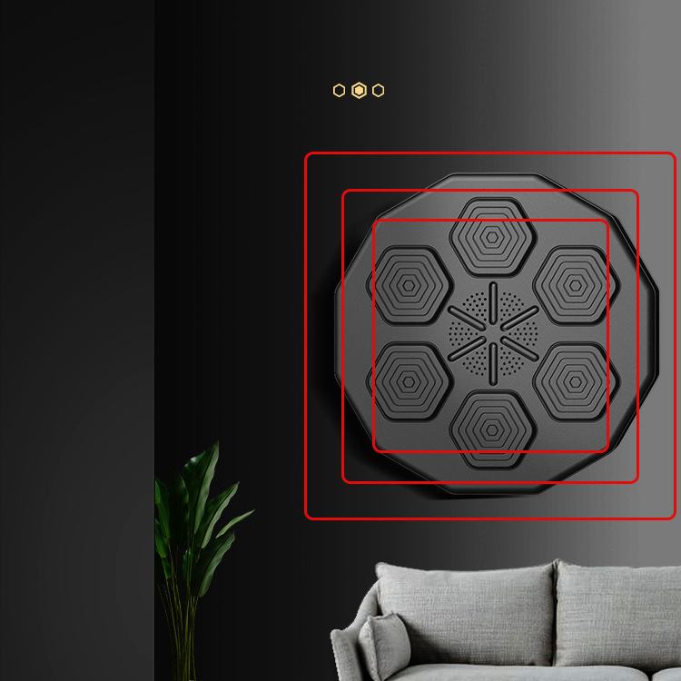 Decorative wall art with geometric design on a dark wall above a sofa