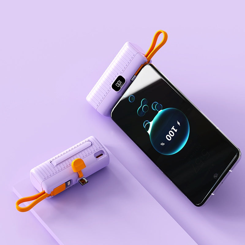 Phone with power bank on a purple background