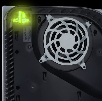 Close-up of a computer case fan with glowing green logo on a black background
