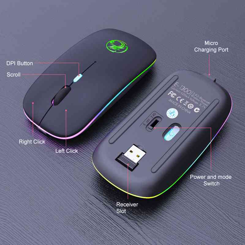 Black wireless mouse with labeled parts on a dark background
