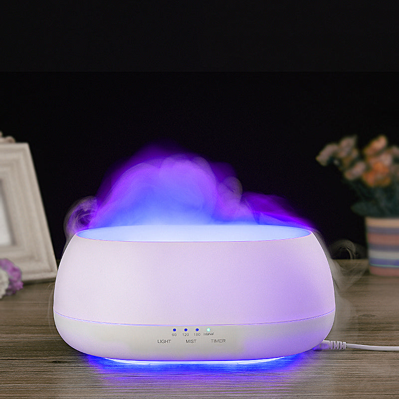 Aromatherapy diffuser emitting mist with a dark background