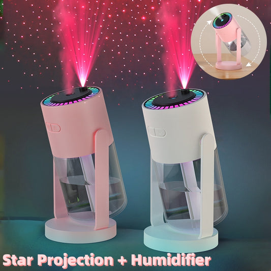 Two star projection humidifiers, one pink and one white, on a dark background with starry light effect.