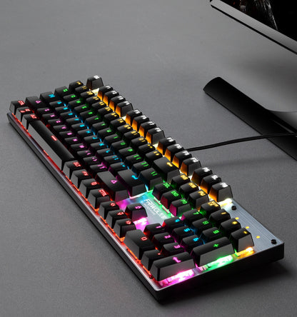 Mechanical keyboard with RGB lighting on a gray surface