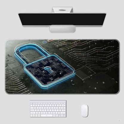 Desk setup with a computer monitor, keyboard, and mouse on a large mouse pad featuring a digital lock design.