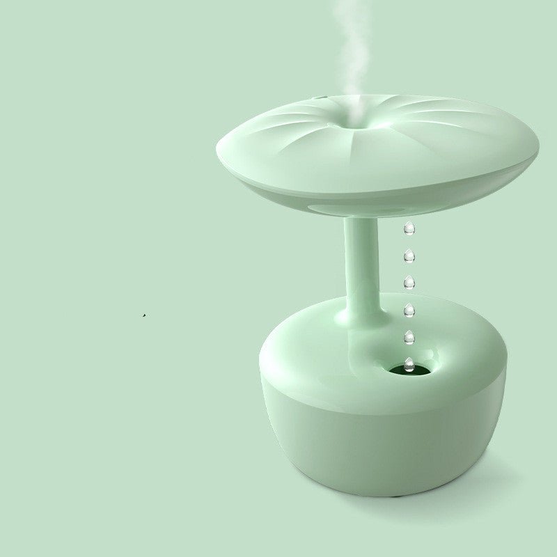 White electronic device emitting steam on a light green background