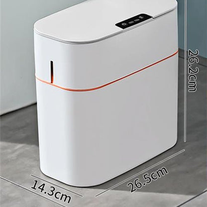 White electronic device with orange accent on a gray surface, showing dimensions.