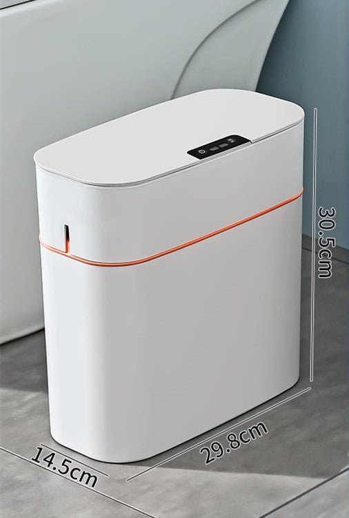 White electronic device with orange accent on a gray surface, showing dimensions.