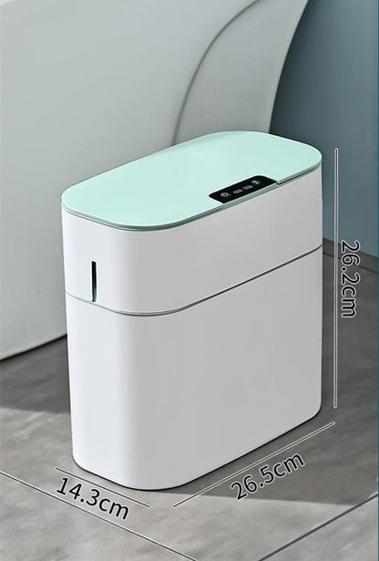 White and light blue electronic device with dimensions displayed on a gray surface.