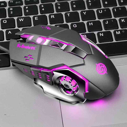 Gaming mouse with purple accents on a keyboard