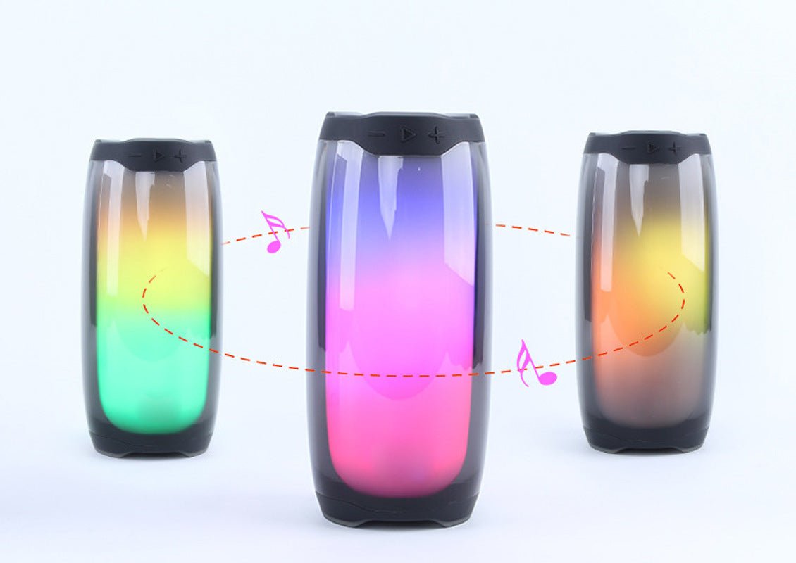 Three cylindrical LED lights with colorful gradient and musical note graphics on a white background