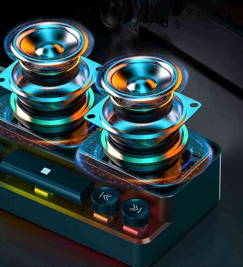 Colorful electronic device with two prominent components on a dark background