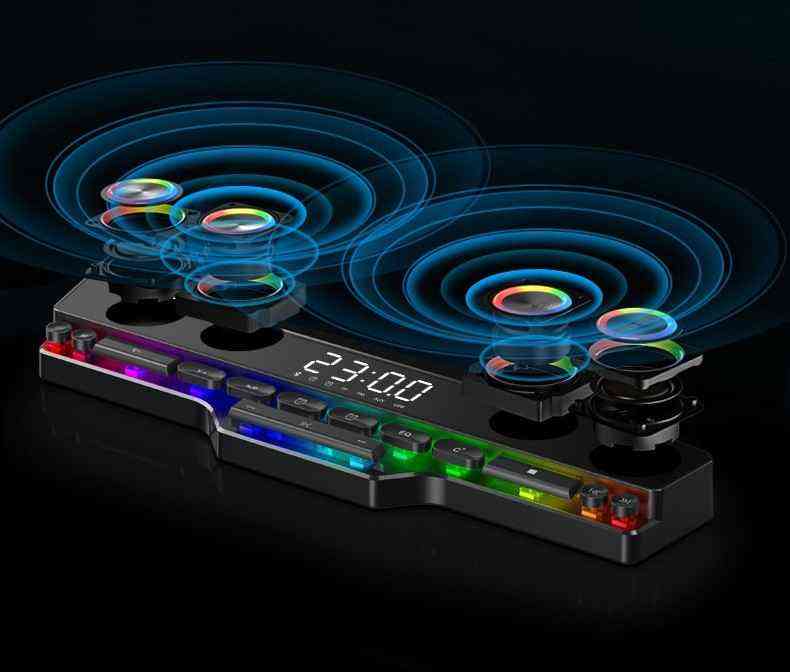 Bluetooth Stereo Gaming Speaker with colorful LED lights and digital display on a dark background