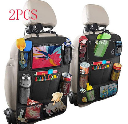 Two car seat back organizers with various items and toys on a white background.