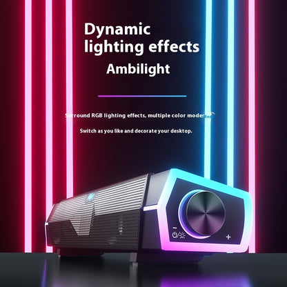 Gaming computer speakers with RGB lighting effects on a dark background