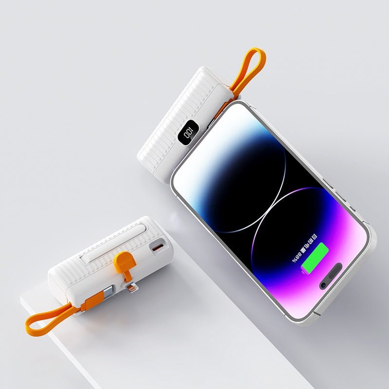 Phone with a power bank on a light gray background