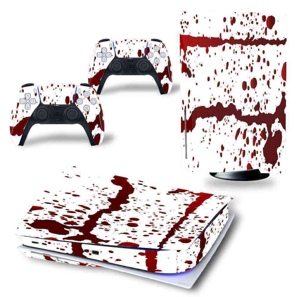 Gaming console and controllers with a blood splatter design on a white background