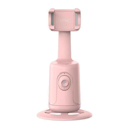 Pink handheld device with a stand on a white background