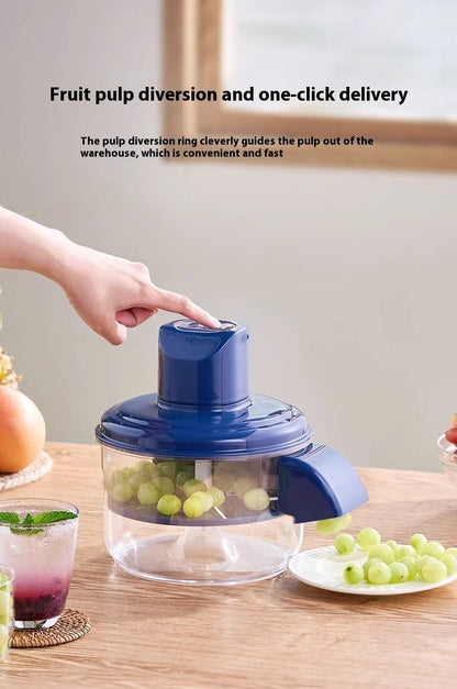 Blue fruit pulper on a wooden table with grapes and a glass of juice, text about fruit pulp diversion.