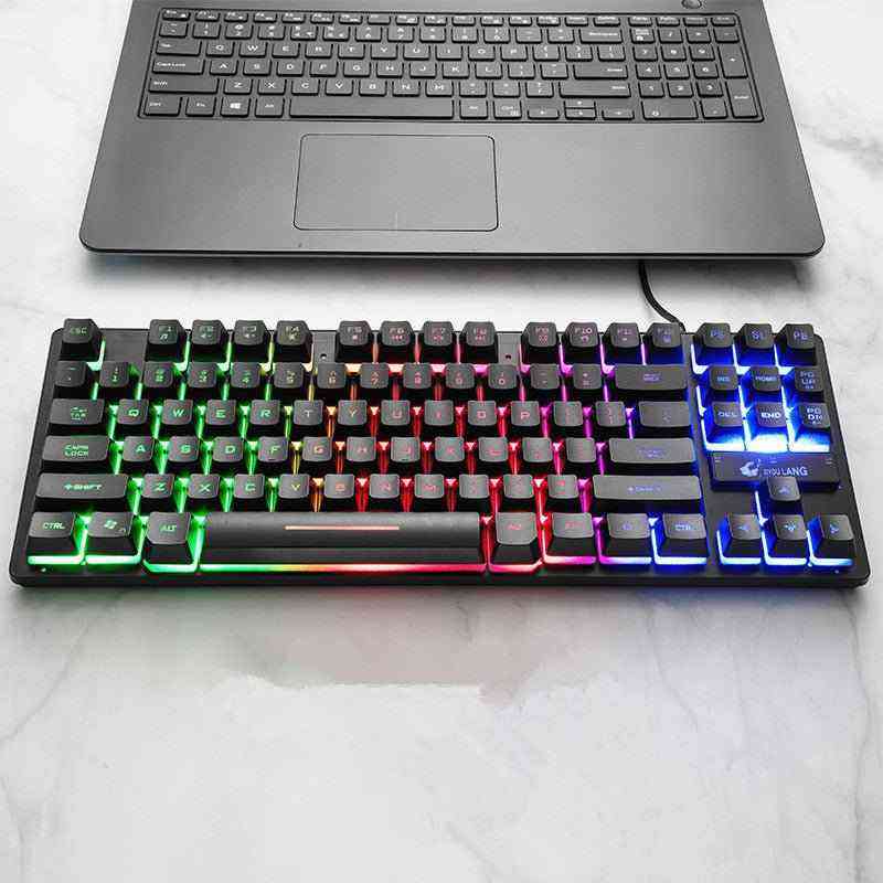 Mechanical keyboard with RGB lighting on a marble surface