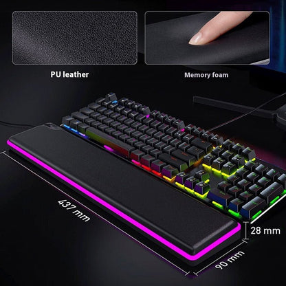 Gaming keyboard with RGB lighting on a black surface, showing PU leather and memory foam features.