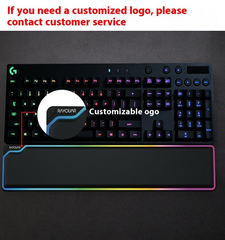 Gaming keyboard with customizable logo on a dark background
