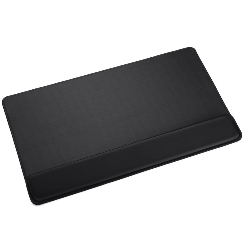 Black desk mat on a white background