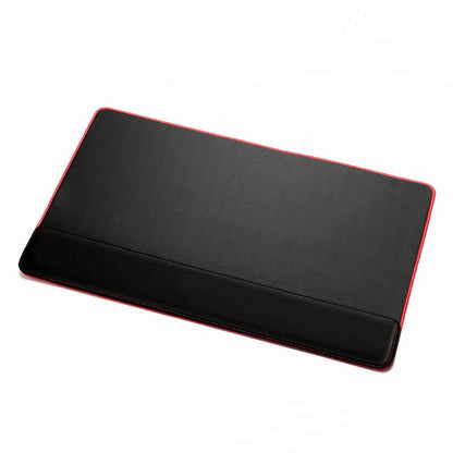 Black desk pad with red edges on a white background