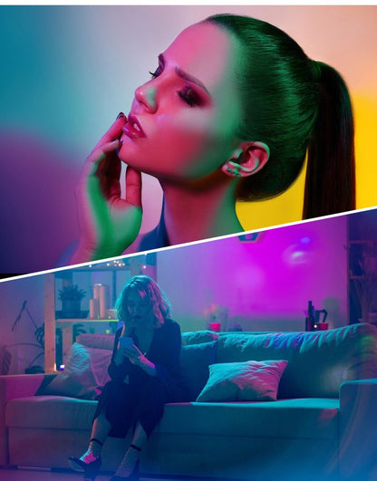 Woman on phone with colorful lighting and a person sitting on a couch in a room with pink and blue lighting.