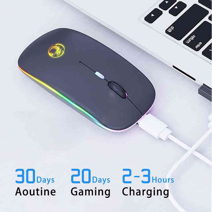 Black wireless mouse with colorful LED lights on a white surface, connected to a laptop.