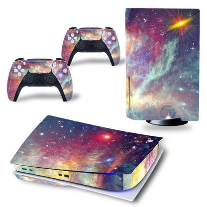 Gaming console and controllers with a colorful nebula design on a white background