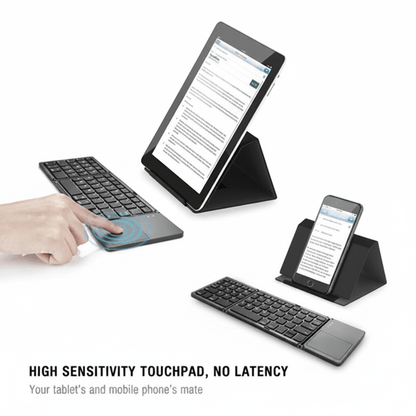 Black wireless tablet and phone keyboard set with built-in kickstands, shown with a tablet, a phone, and a hand touching the keyboard's touchpad. Text at the bottom reads 'HIGH SENSITIVITY TOUCHPAD, NO LATENCY' and 'Your tablet's and mobile phone's mate'.