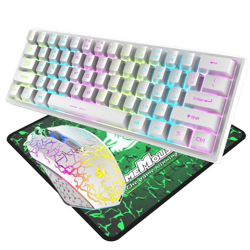 Mechanical keyboard with RGB lighting on a mouse pad featuring a colorful design.