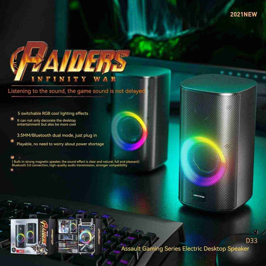 RGB Gaming Desktop Speakers on a desk with a computer setup.
