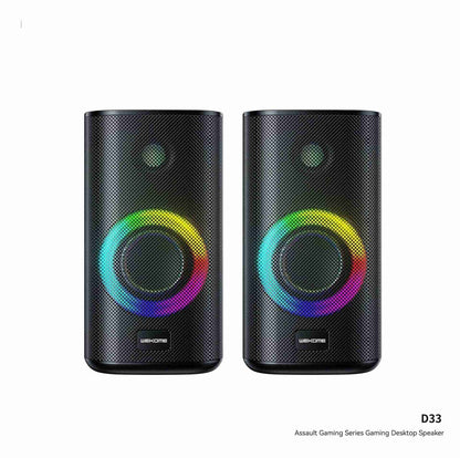 Pair of black gaming desktop speakers with RGB lighting on a white background