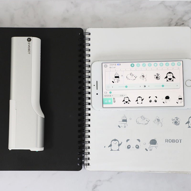 Notebook with a smartphone displaying app icons on a marble surface