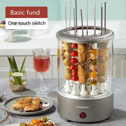 Hot dog and skewer warmer on a table with food and drinks in the background